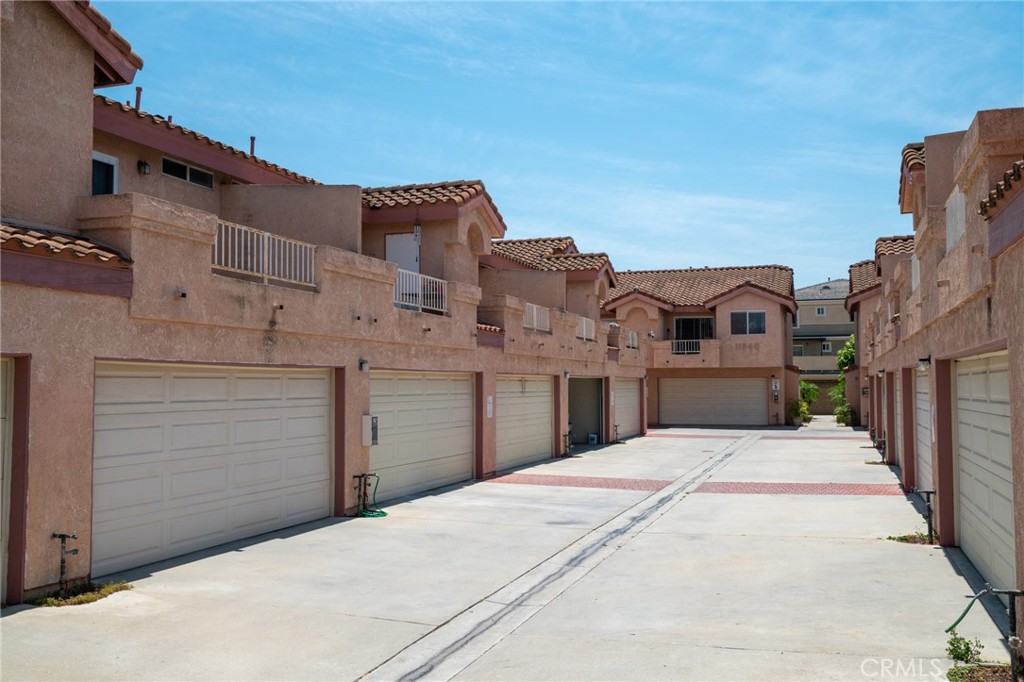 11932 207th Street Lakewood, CA 90715 - Photo 9 of 15 a view of a white building
