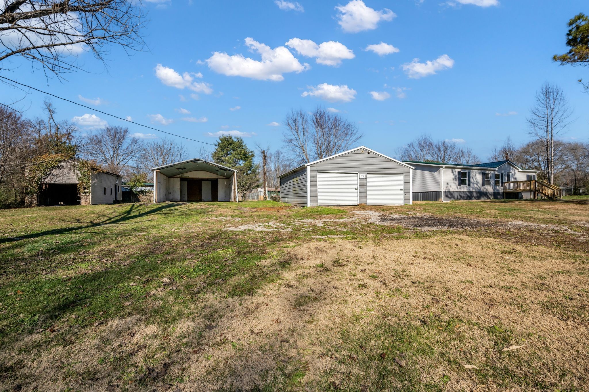2335 Wayne Road Bon Aqua, TN 37025 - Photo 29 of 30 a front view of a house with a yard