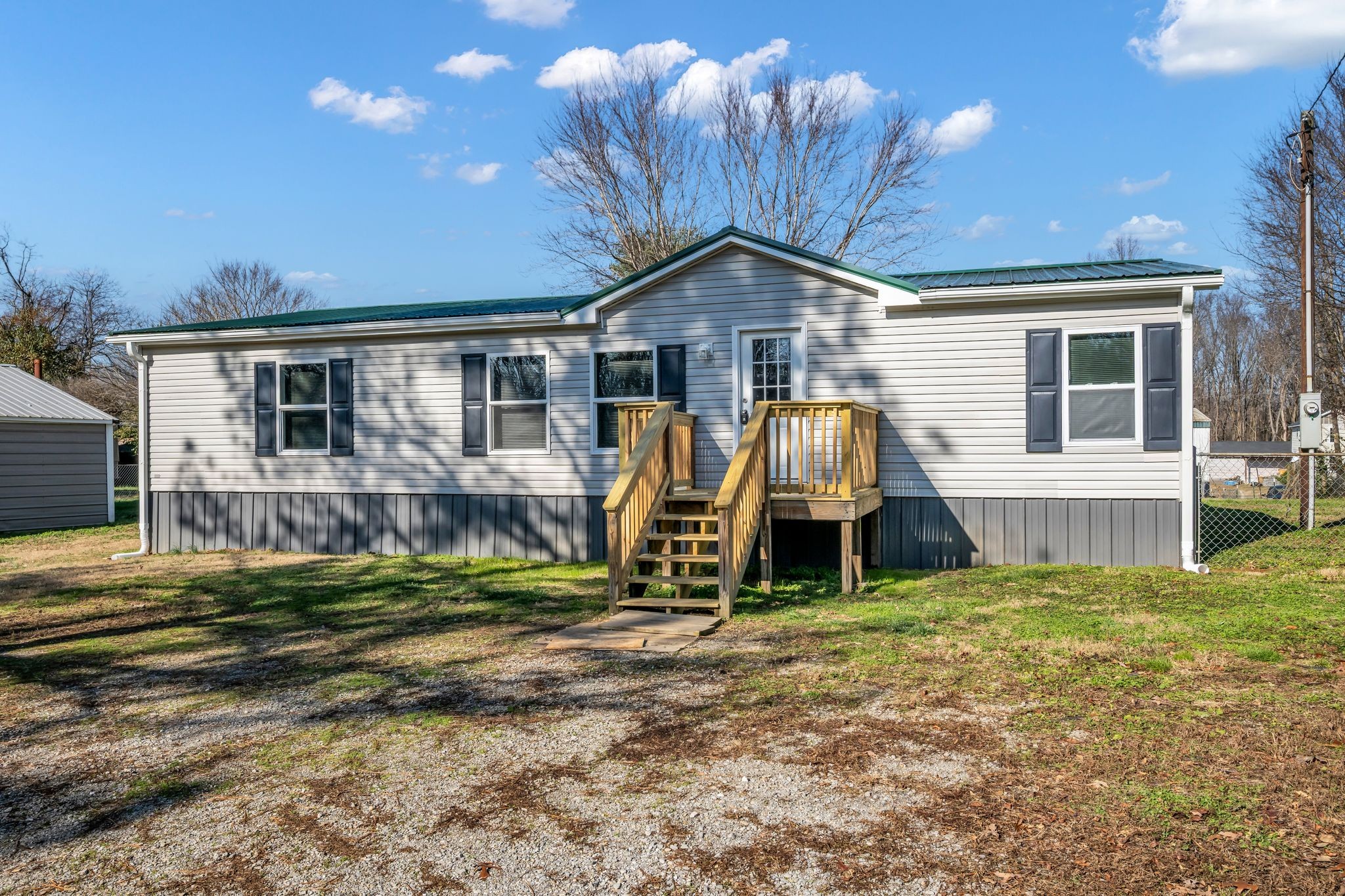 2335 Wayne Road Bon Aqua, TN 37025 - Photo 4 of 30 a front view of a house with garden