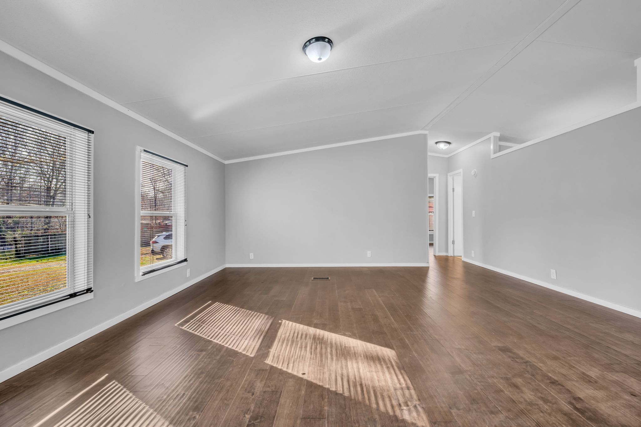 2335 Wayne Road Bon Aqua, TN 37025 - Photo 7 of 30 wooden floor in an empty room with a window