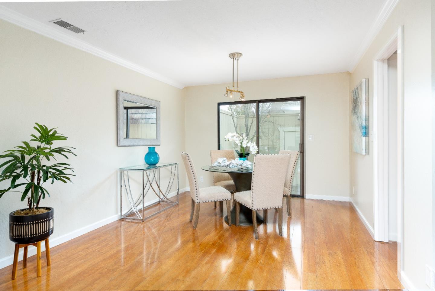 803 Curtis Street Menlo Park, CA 94025 - Photo 3 of 17 a view of a dining room with furniture window and wooden floor