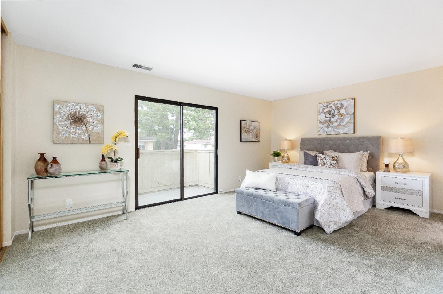 803 Curtis Street Menlo Park, CA 94025 - Photo 6 of 17 a spacious bedroom with a bed and a window