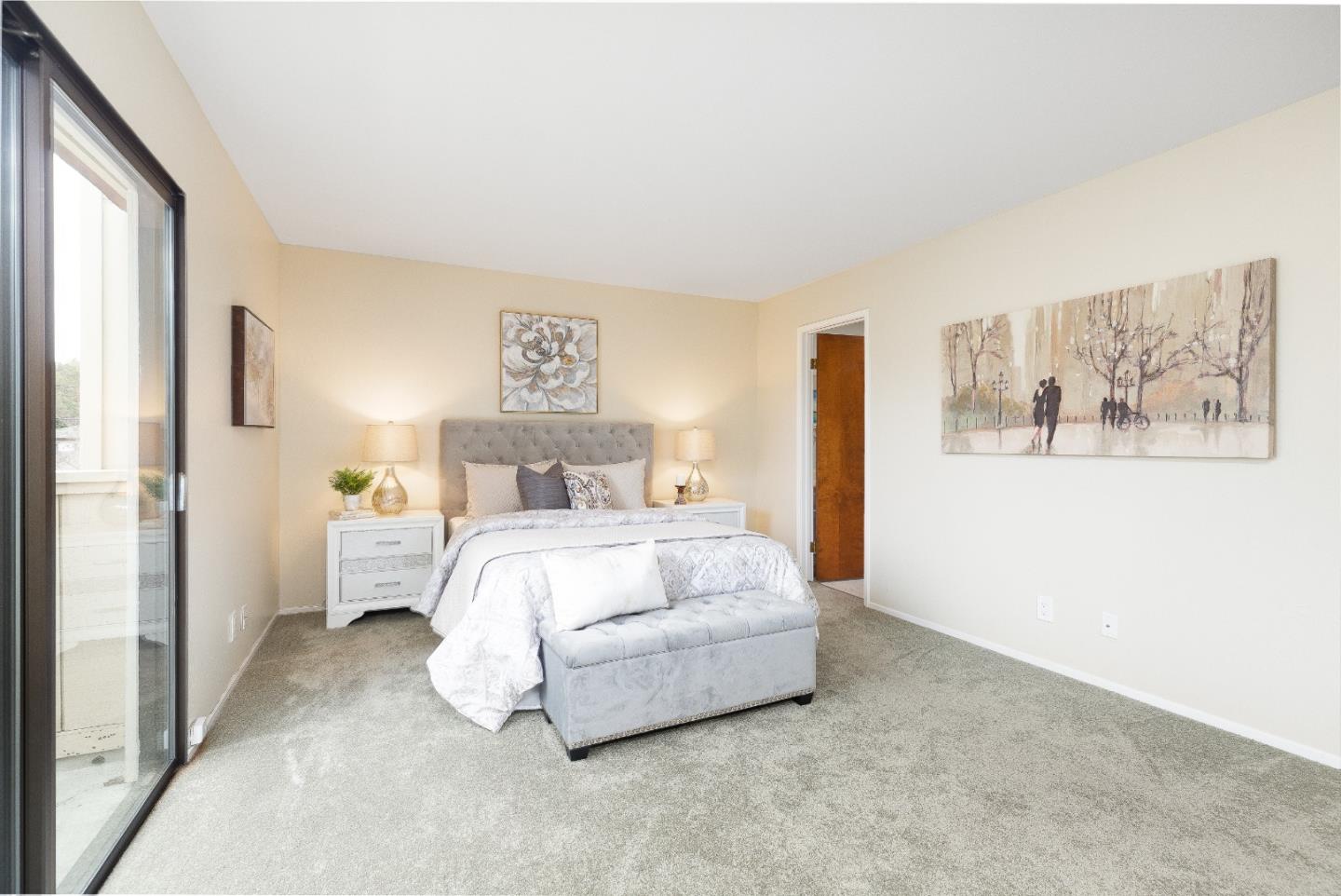 803 Curtis Street Menlo Park, CA 94025 - Photo 7 of 17 a bedroom with a bed and a painting on the wall