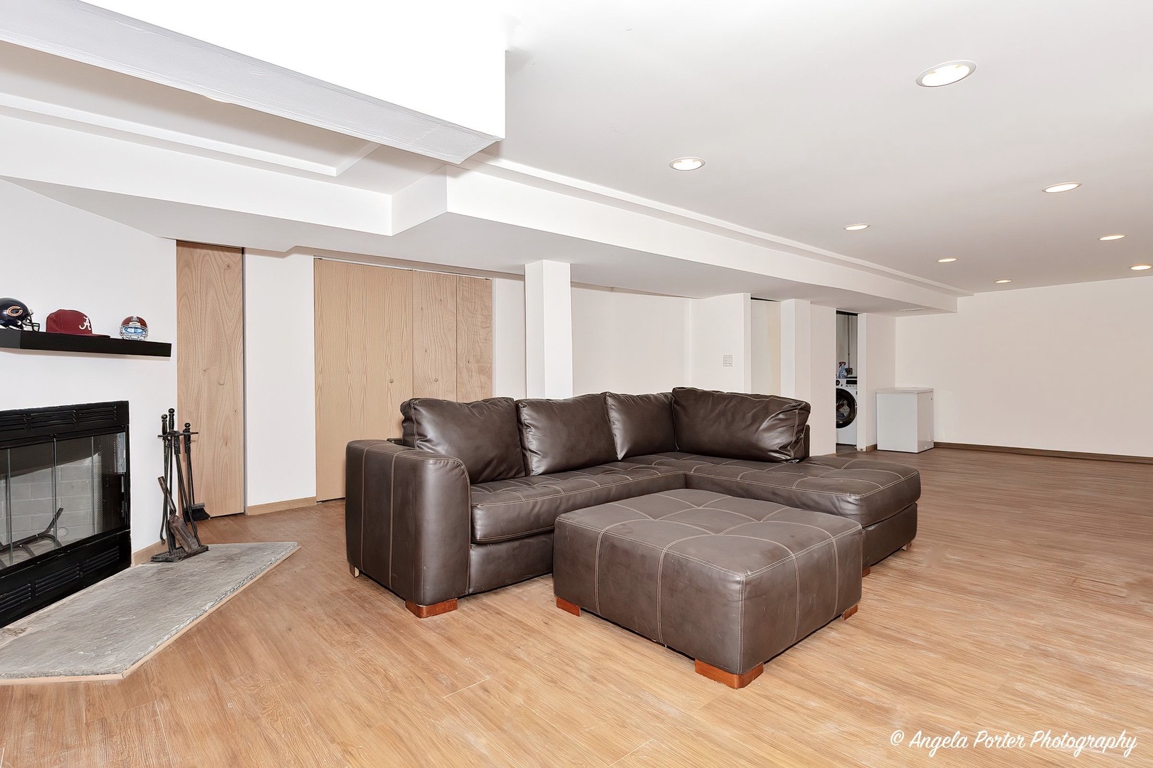 417 Deerpath Drive Lindenhurst, IL 60046 - Photo 15 of 23 a living room with a couch and a fireplace