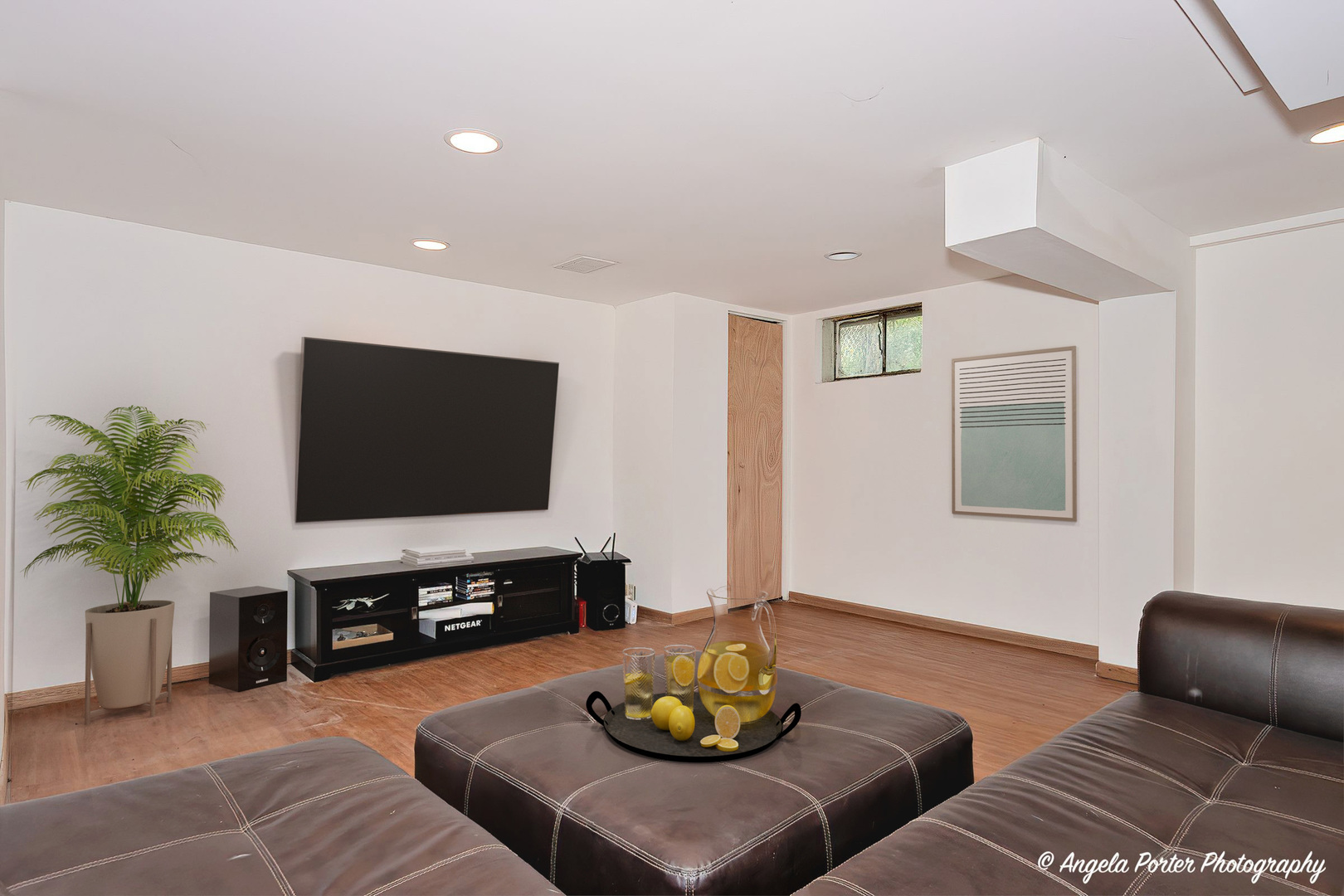 417 Deerpath Drive Lindenhurst, IL 60046 - Photo 16 of 23 a living room with furniture and a flat screen tv