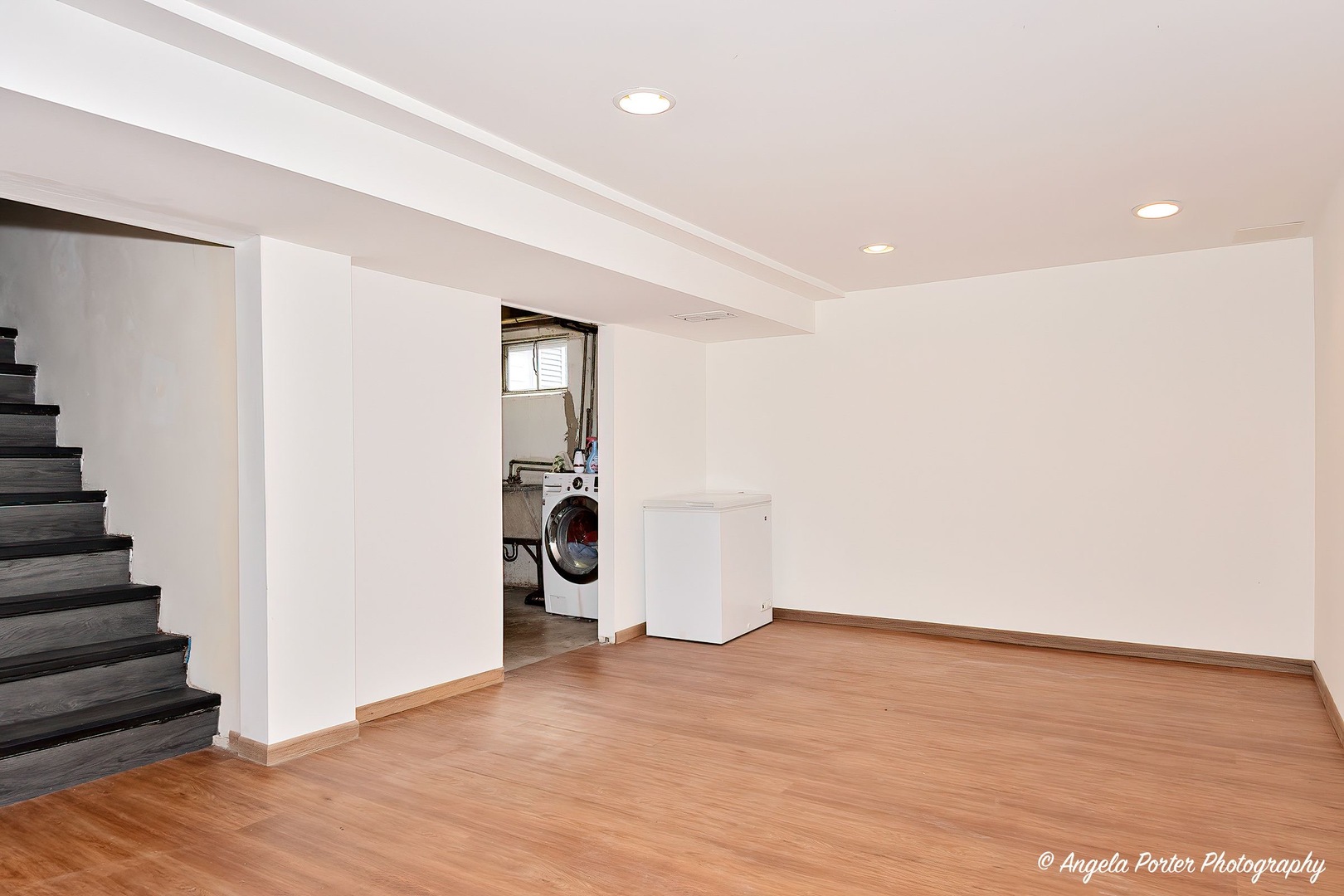 417 Deerpath Drive Lindenhurst, IL 60046 - Photo 18 of 23 a view of a room with wooden floor and stairs