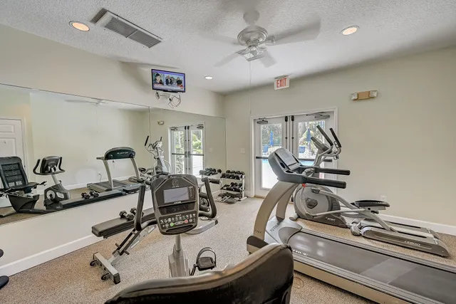 a view of a two chairs on the roof deck