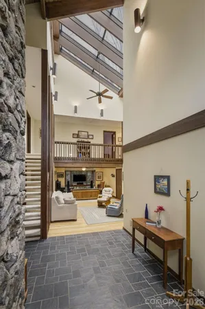 a outdoor space with patio the couches and a potted plant on a coffee table