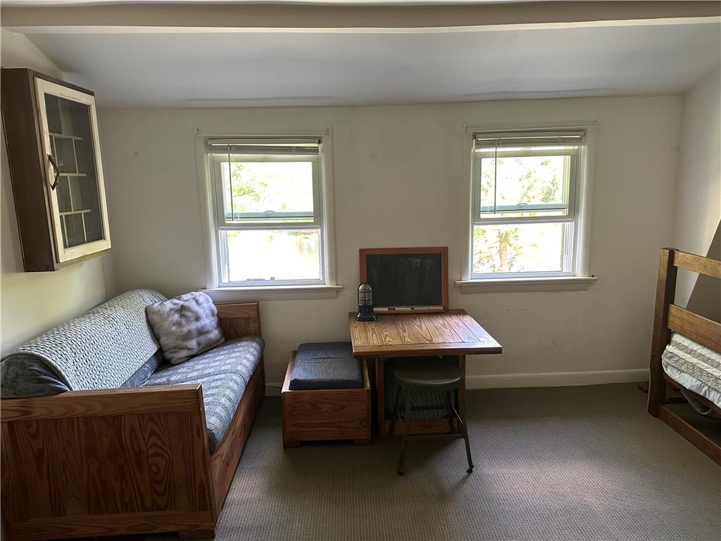 10 Kizer Pond Road Lake Ariel, PA 18436 - Photo 33 of 48 Well-lit room, featuring twin windows, comfortable daybed, and sturdy bunk beds.
