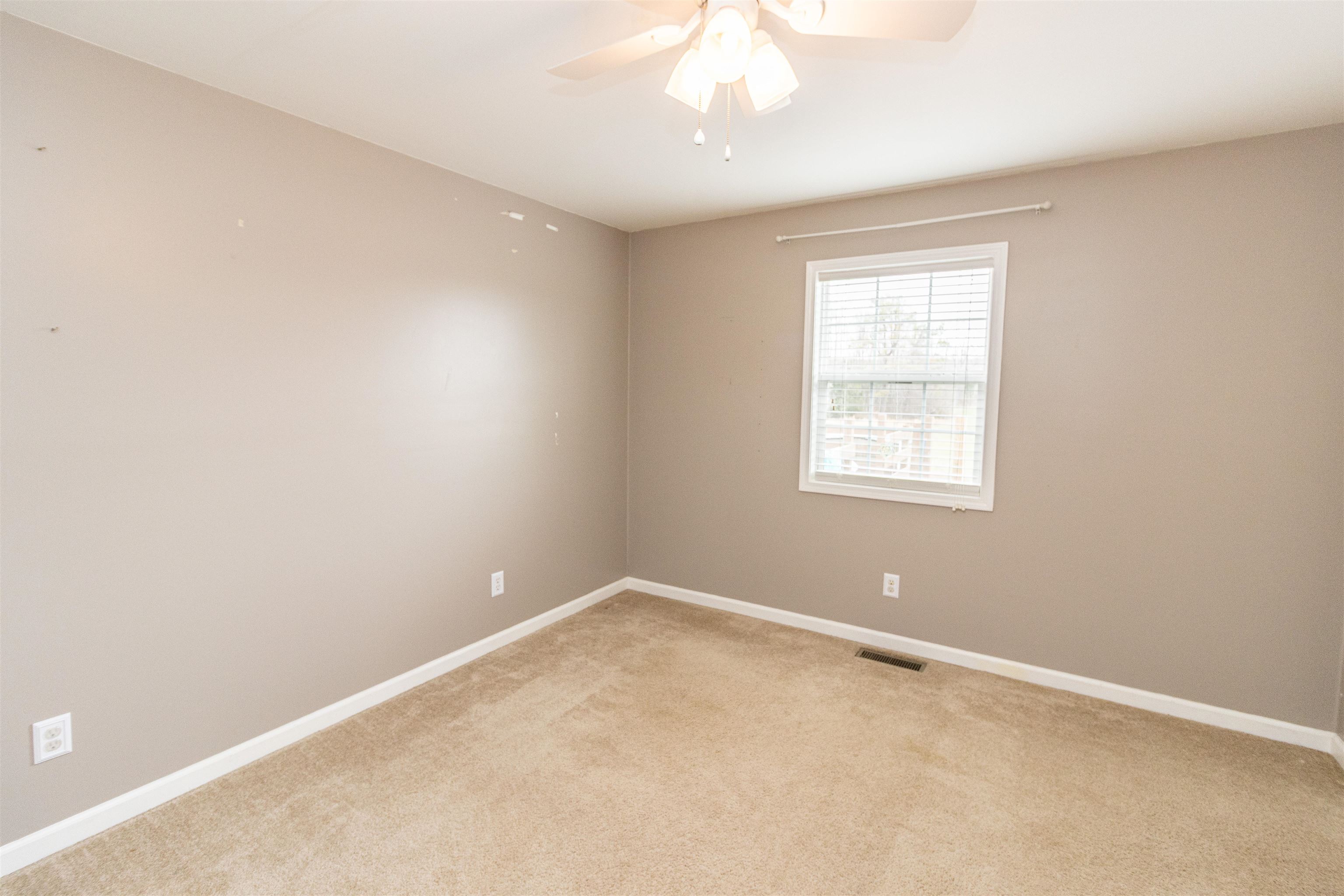 1468 Matrose Carroll Road Michie, TN 38357 - Photo 15 of 27 an empty room with a window