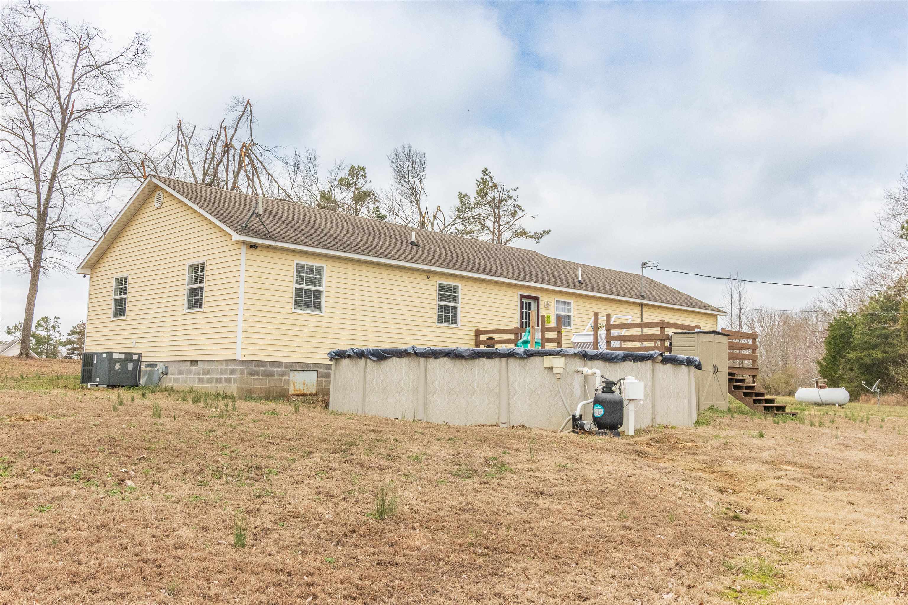 1468 Matrose Carroll Road Michie, TN 38357 - Photo 24 of 27 a view of a house with snow on the road