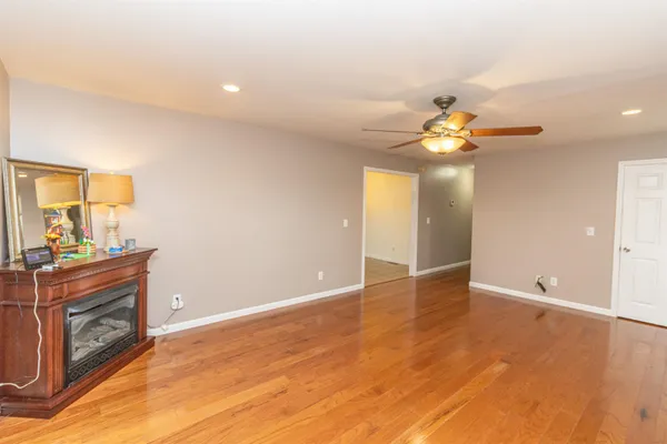 a view of a livingroom with a kitchen