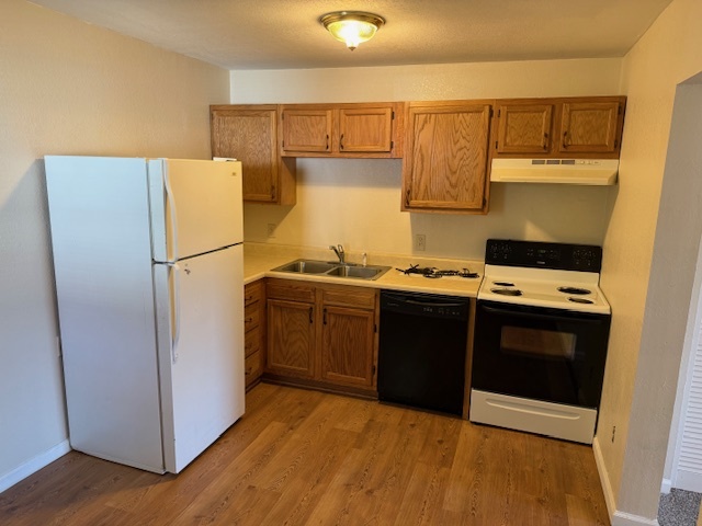 312 East Hester Street Carbondale, IL 62901 - Photo 4 of 14 a kitchen with a refrigerator and a stove