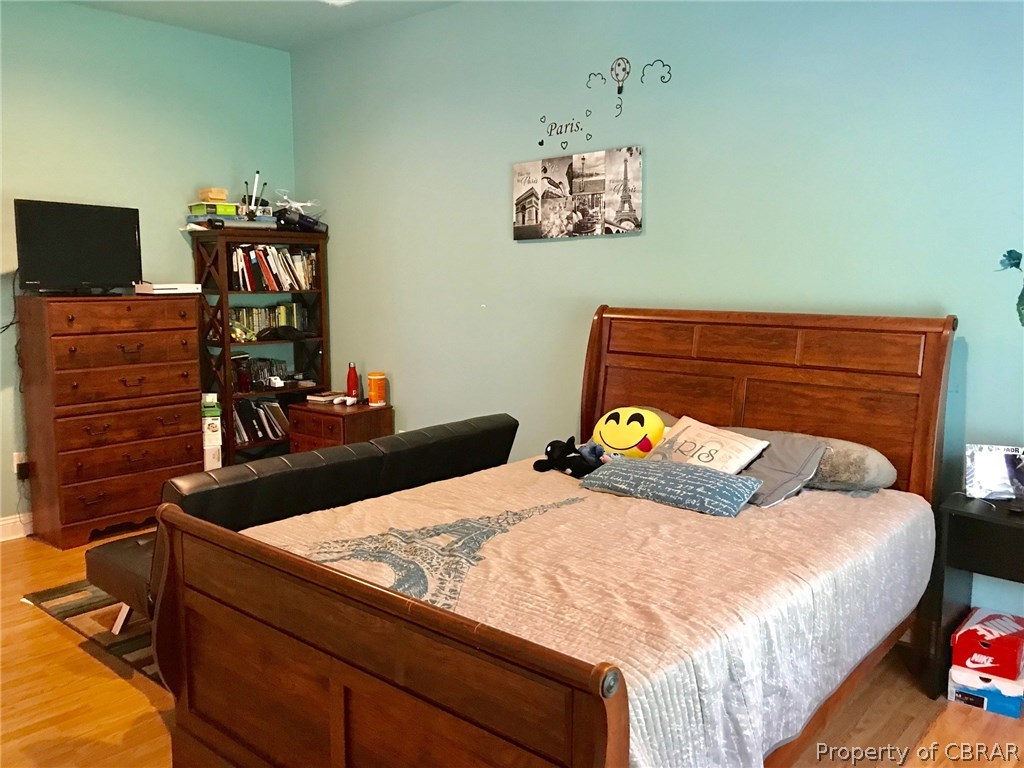 3939 Funny Farm Road Hayes, VA 23072 - Photo 12 of 17 Bedroom 2 on 1st level with walk in closet and en suite bath