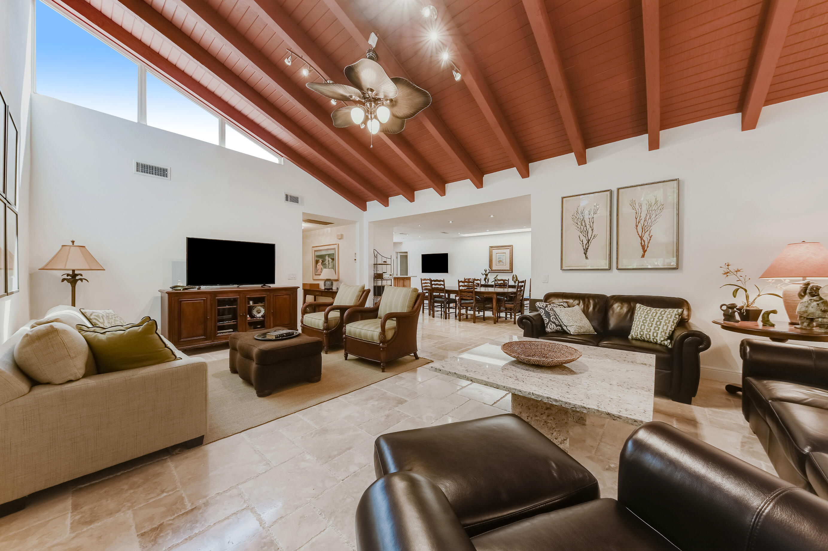 9300 Vista Del Lago, Unit 6B Boca Raton, FL 33428 - Photo 6 of 22 a living room with furniture and a flat screen tv