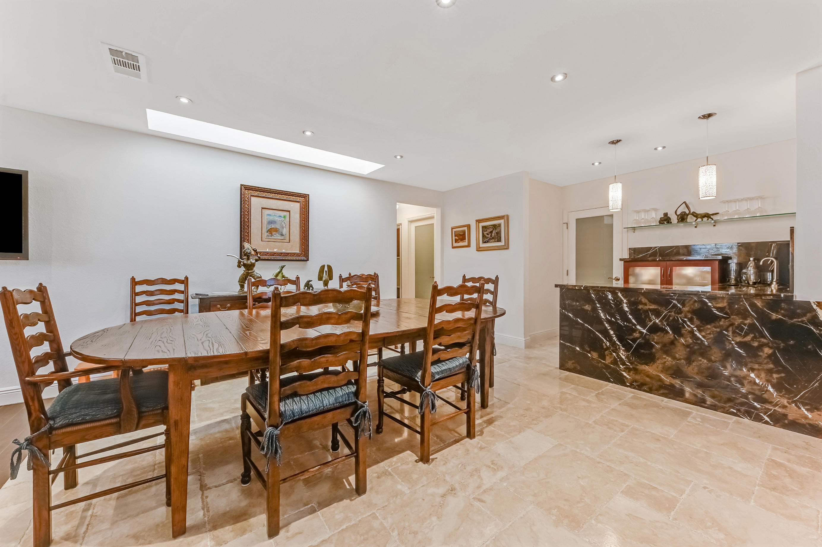 9300 Vista Del Lago, Unit 6B Boca Raton, FL 33428 - Photo 7 of 22 a view of a dining room with furniture