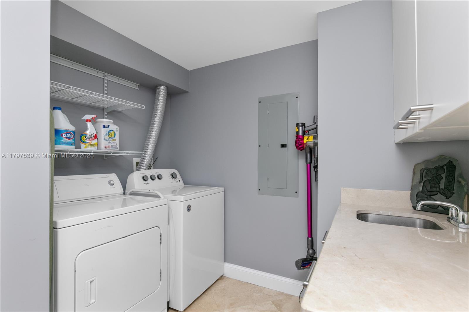 3350 Southwest 27th Avenue, Unit 902 Miami, FL 33133 - Photo 26 of 40 a room with storage and utility