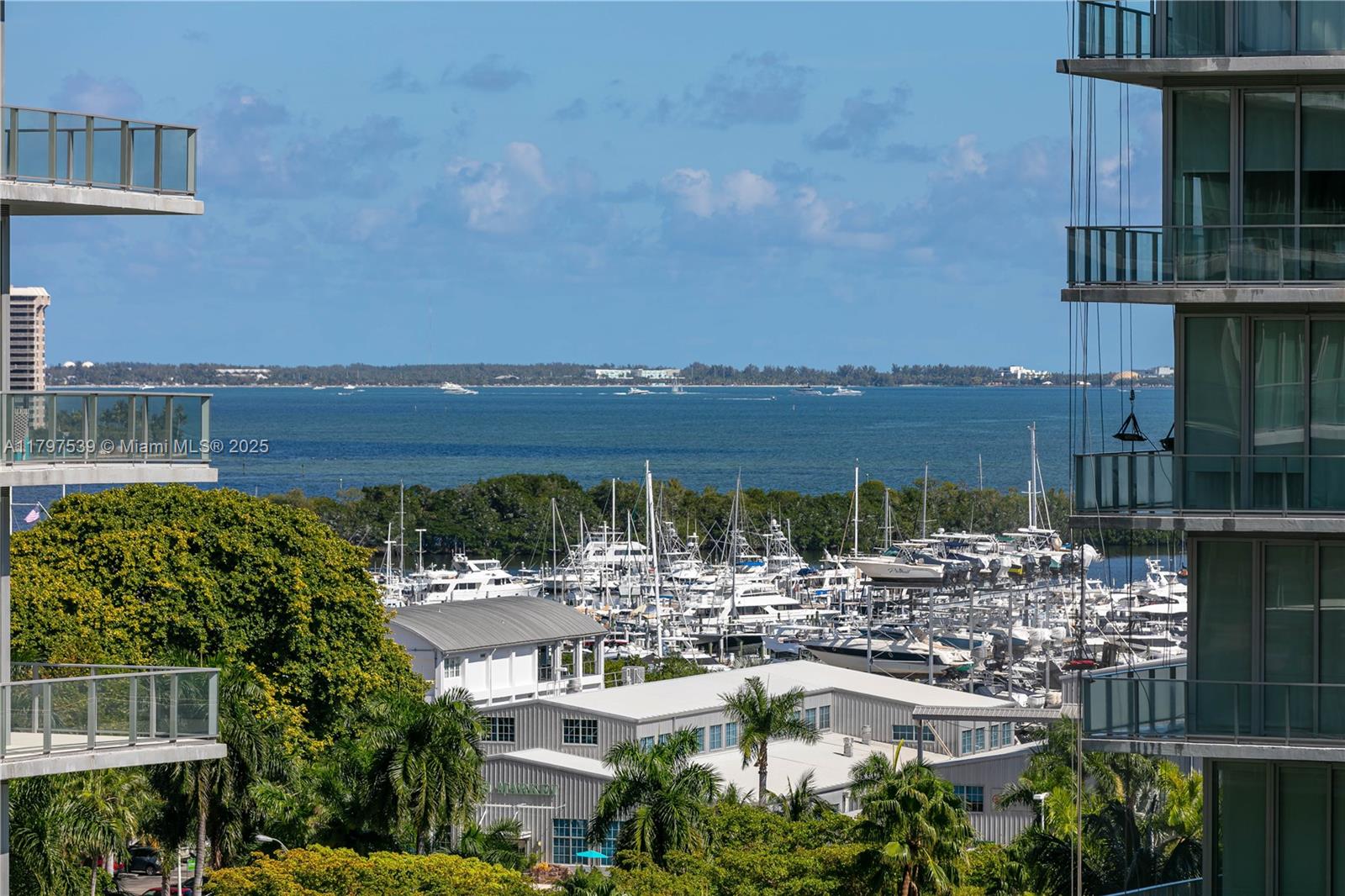 3350 Southwest 27th Avenue, Unit 902 Miami, FL 33133 - Photo 40 of 40 a picture of houses with outdoor space and lake view
