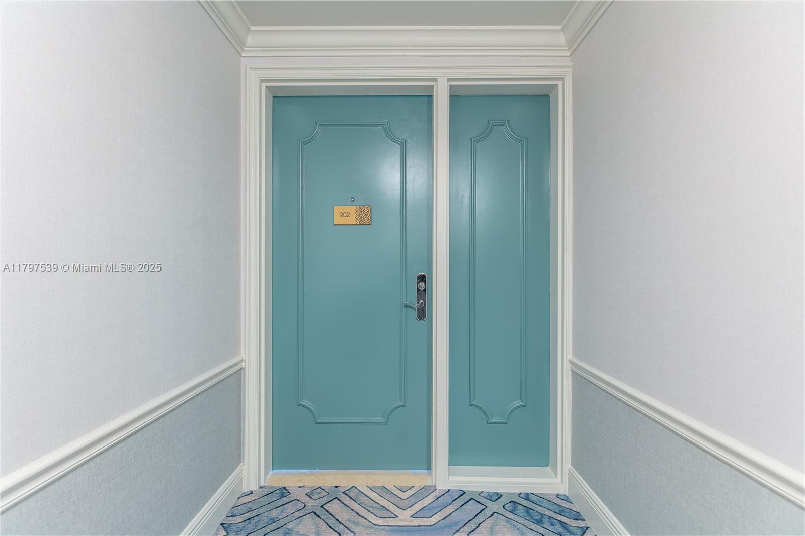 3350 Southwest 27th Avenue, Unit 902 Miami, FL 33133 - Photo 5 of 40 a bathroom with a sink