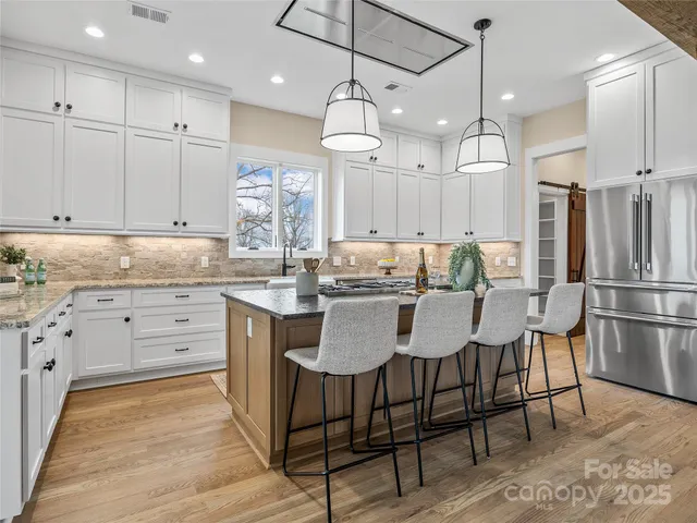 a balcony with furniture and outdoor view
