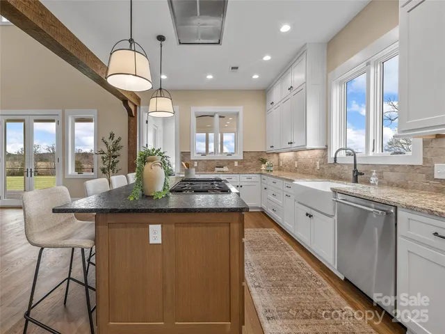 a bedroom with a large bed and a large window