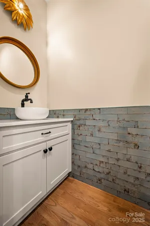 a living room with fireplace furniture and a flat screen tv