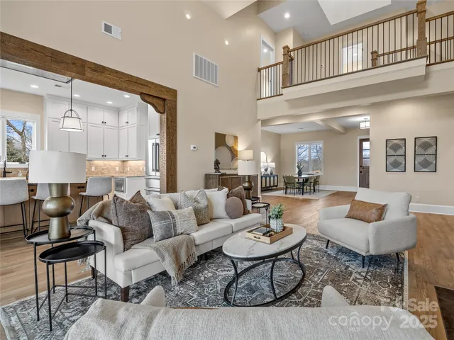 a view of a dining room with furniture and a window