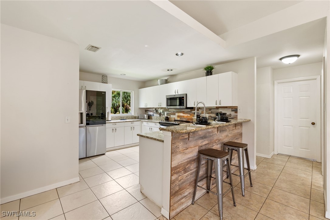 2565 Oil Well Road Naples, FL 34120 - Photo 11 of 26