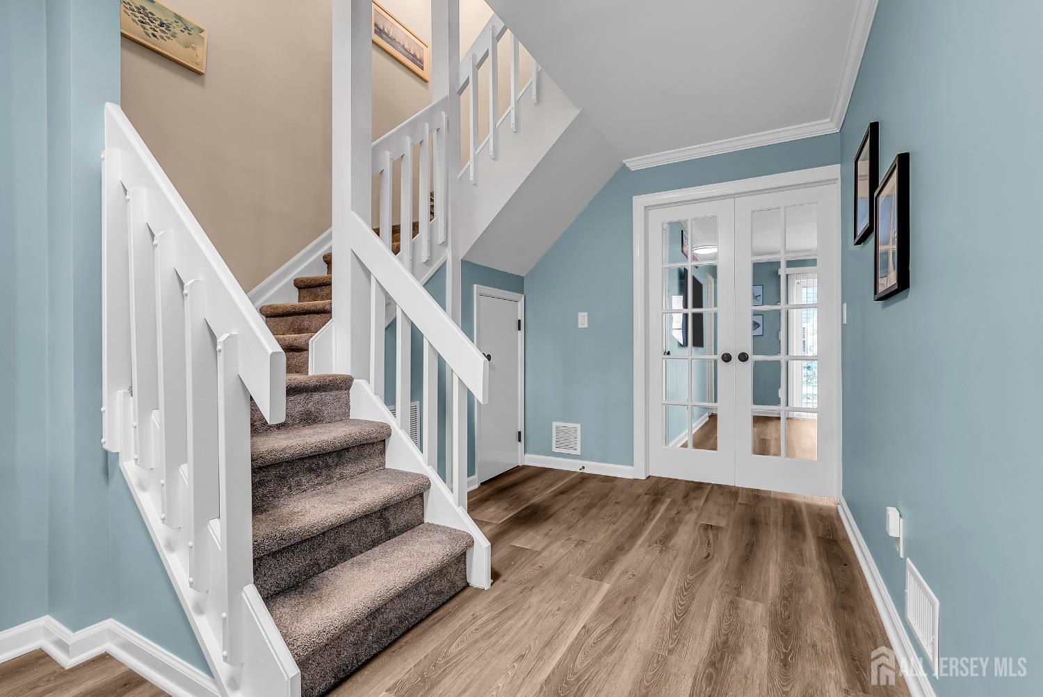 303 Spinnaker Way Neptune, NJ 07753 - Photo 11 of 54 a view of entryway and hall with wooden floor