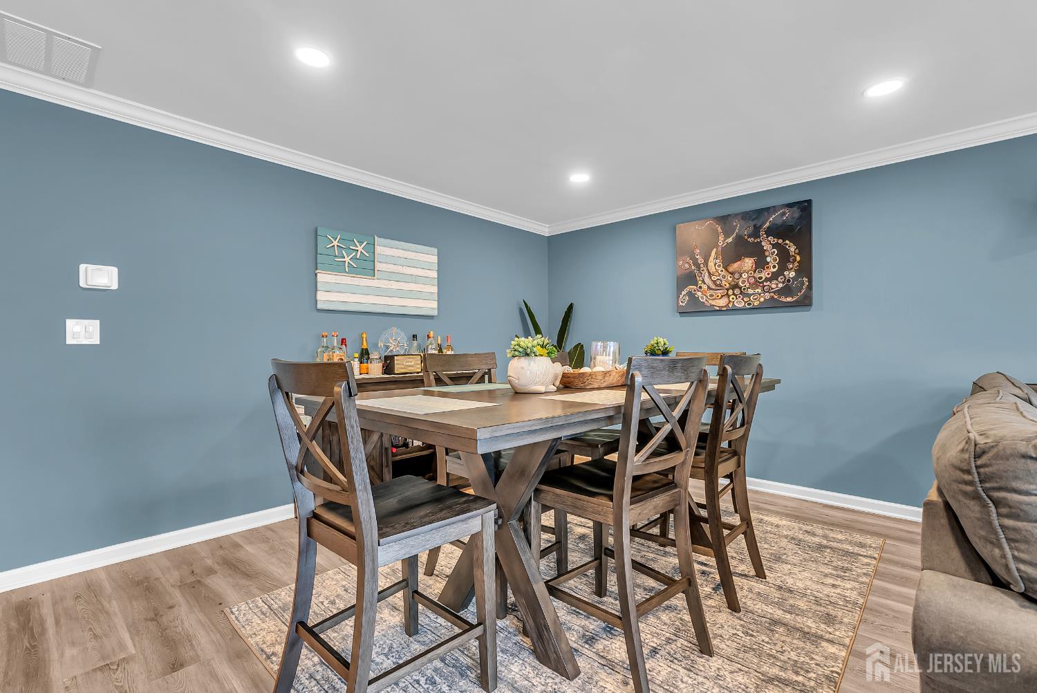 303 Spinnaker Way Neptune, NJ 07753 - Photo 17 of 54 a view of a dining room with furniture