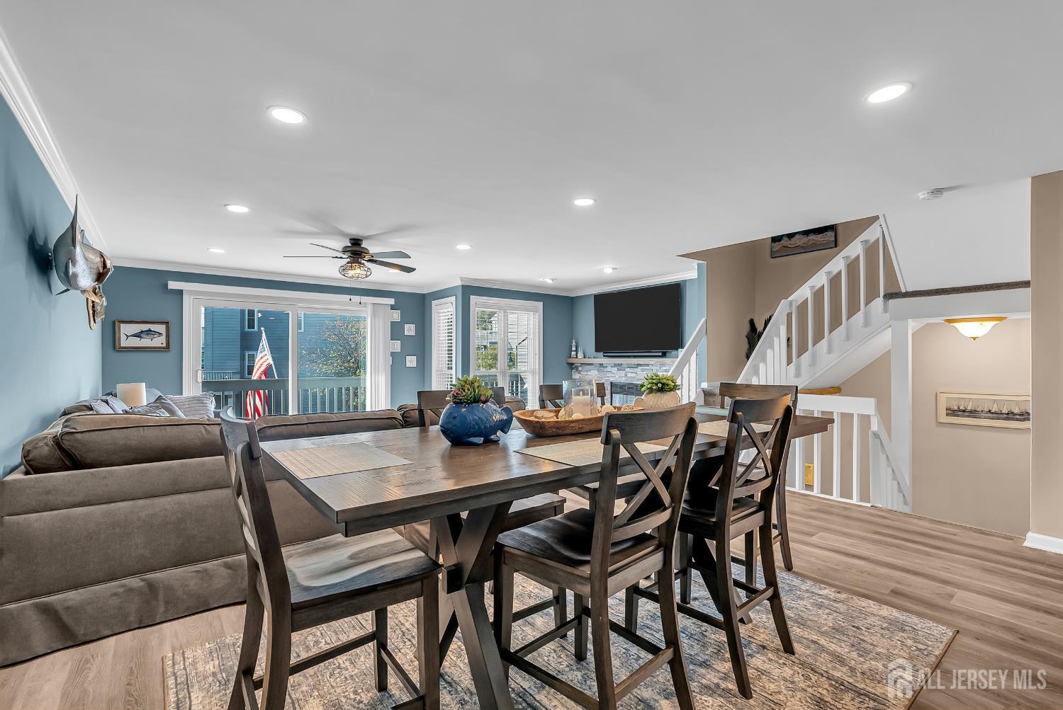 303 Spinnaker Way Neptune, NJ 07753 - Photo 18 of 54 a view of a dining room with furniture
