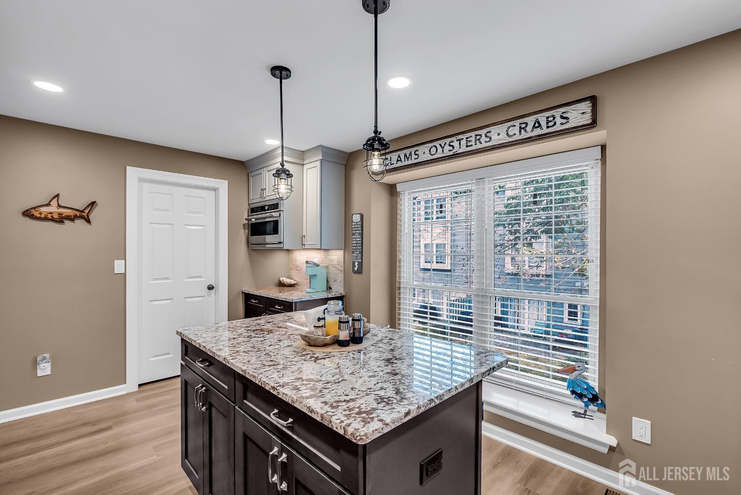 303 Spinnaker Way Neptune, NJ 07753 - Photo 26 of 54 a kitchen with sink and refrigerator