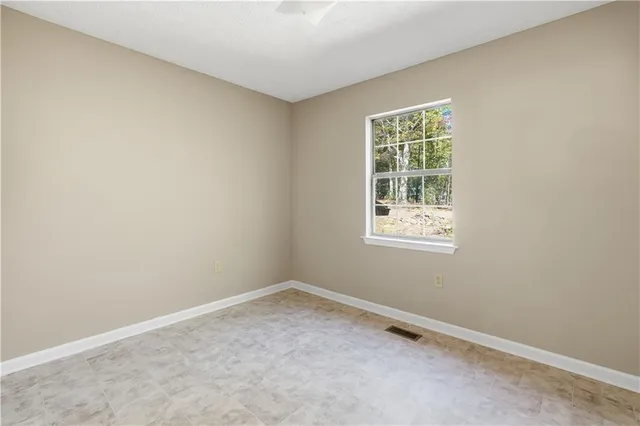 an empty room with a window