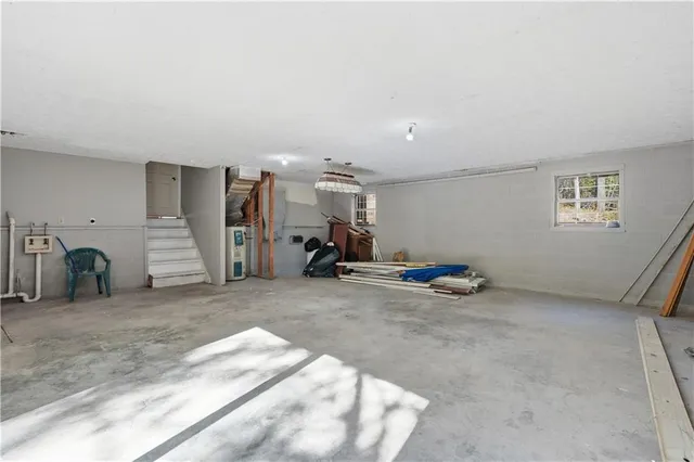 a view of a livingroom with storage and utility