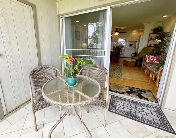 a kitchen with a table and chairs