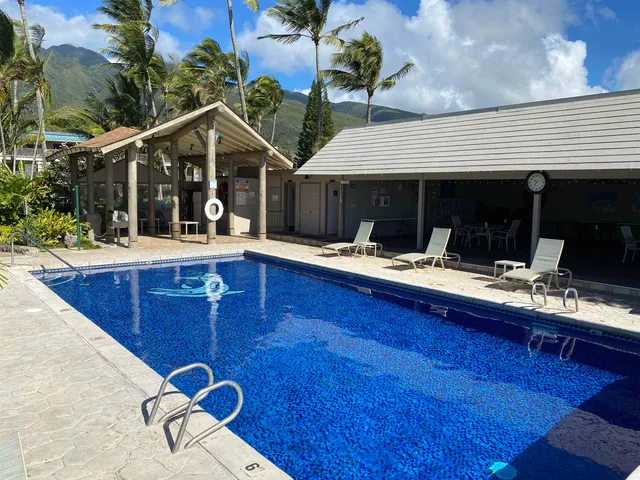 a view of house with chairs and tables