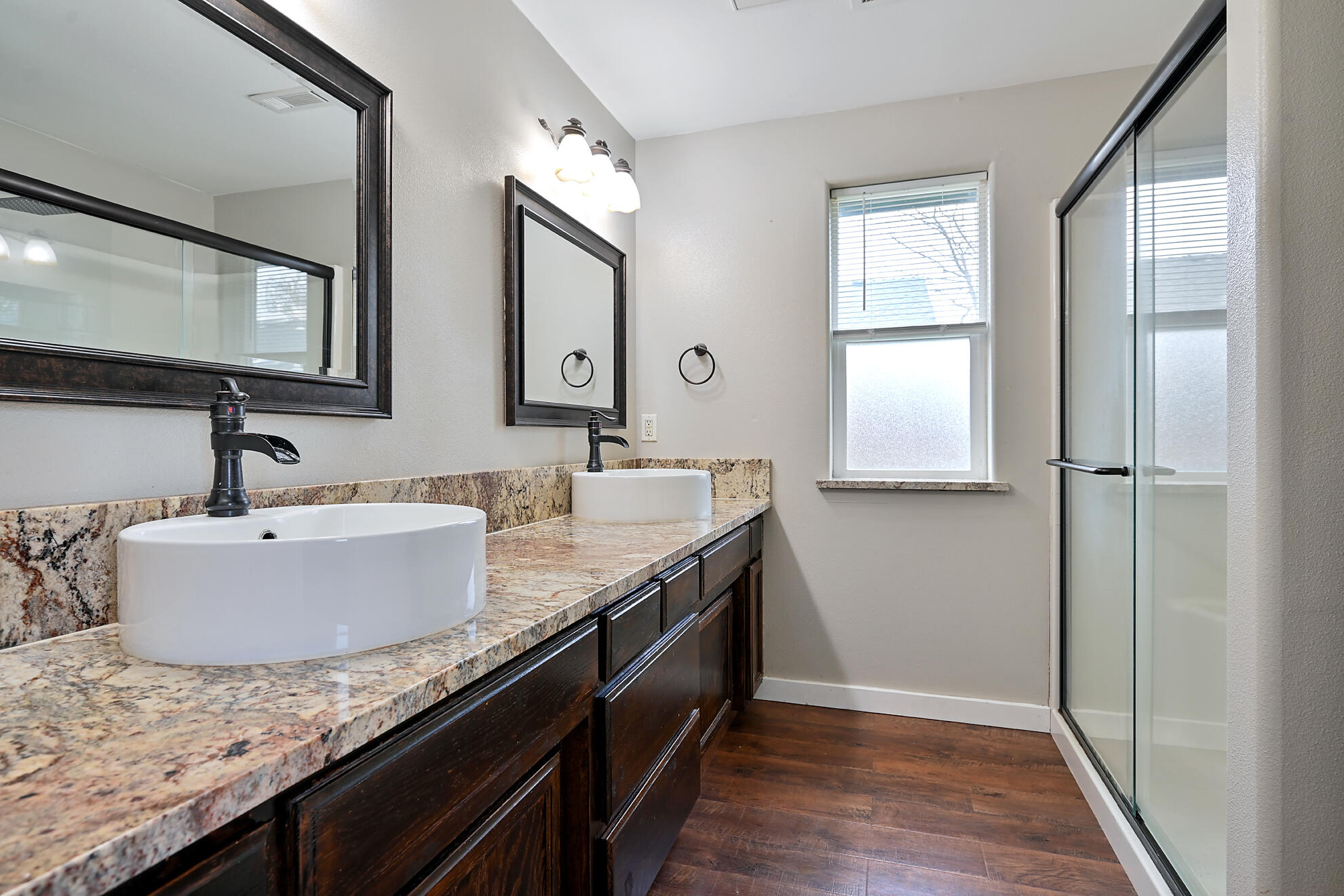836 Ridgeview Drive Eagle Point, OR 97524 - Photo 11 of 19 a bathroom with granite countertop double vanity and a mirror