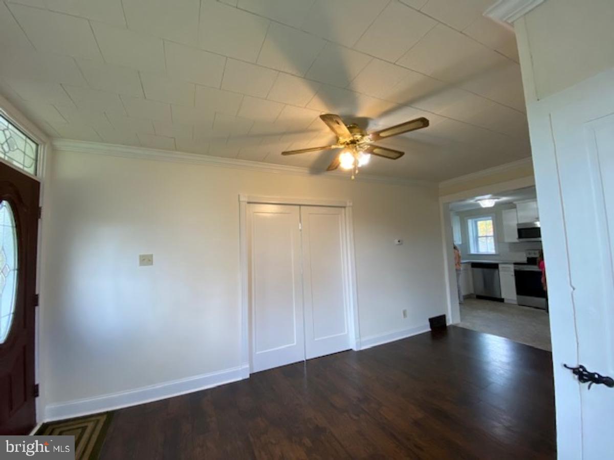 7961 Creamery Road Alburtis, PA 18011 - Photo 3 of 19 LR with pocket door leading to Fst Flr MBR