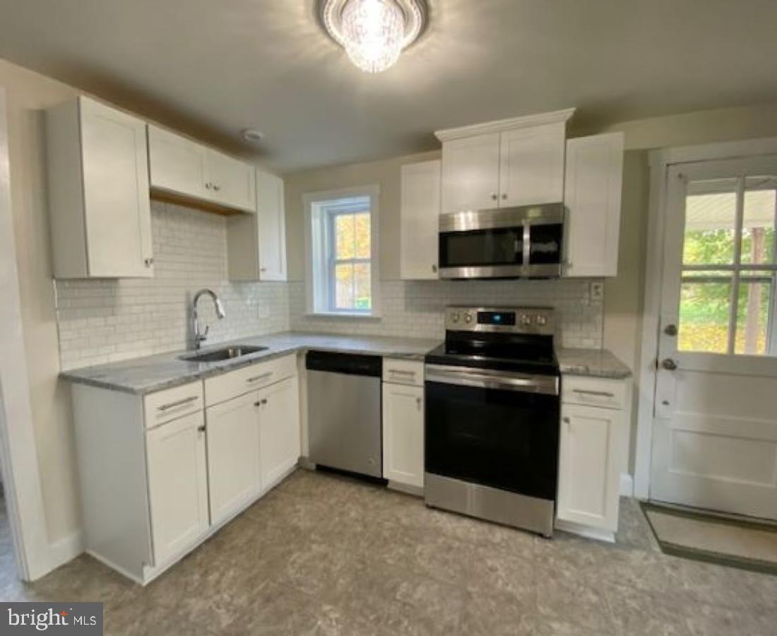 7961 Creamery Road Alburtis, PA 18011 - Photo 5 of 19 New Cabinetry, SS appliances, DW, Microwave