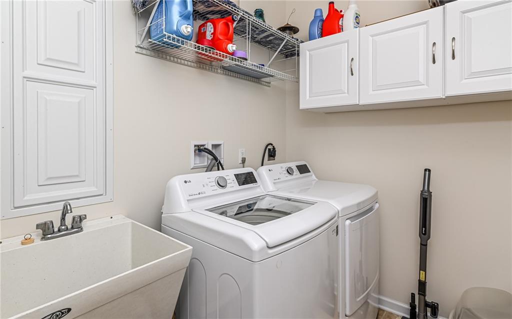 150 Independence Way Sewickley, PA 15143 - Photo 29 of 42 Convenient Main Level 7x6 Laundry with Storage Racks, Cabinets & Laundry Tub ~ and Yes ... Washer and Dryer are included!