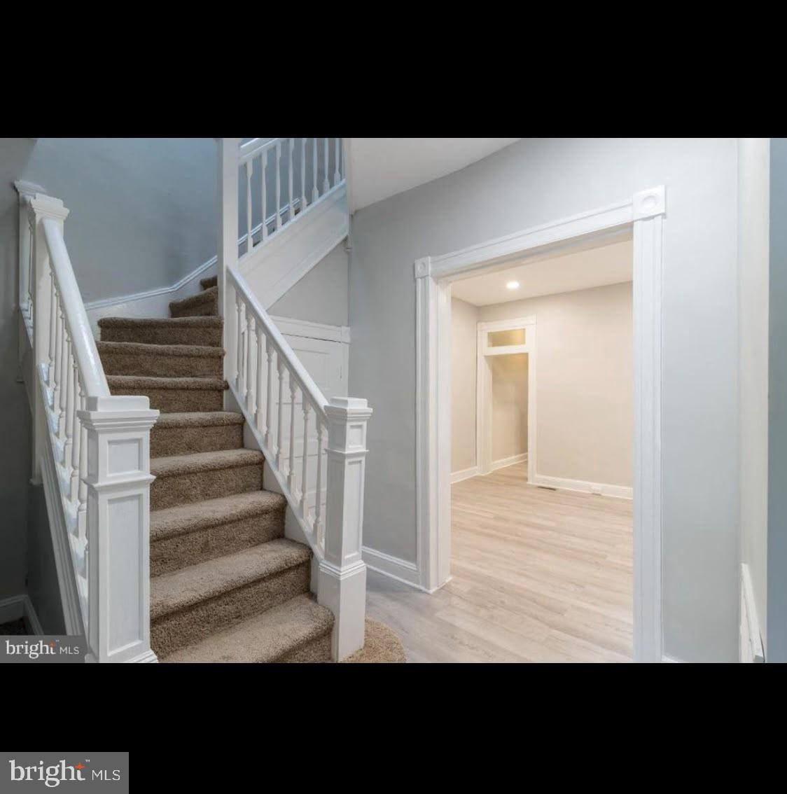 1626 Appleton Street Baltimore, MD 21217 - Photo 9 of 18 a view of entryway and hall with wooden floor