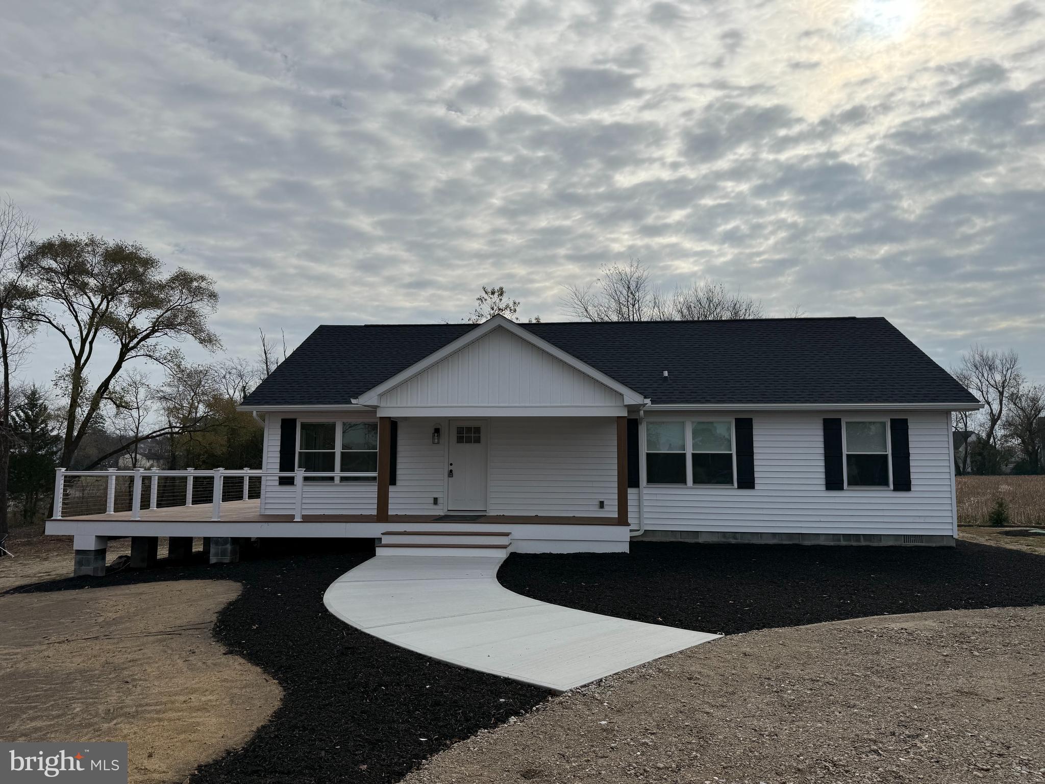 a house view with a garden space