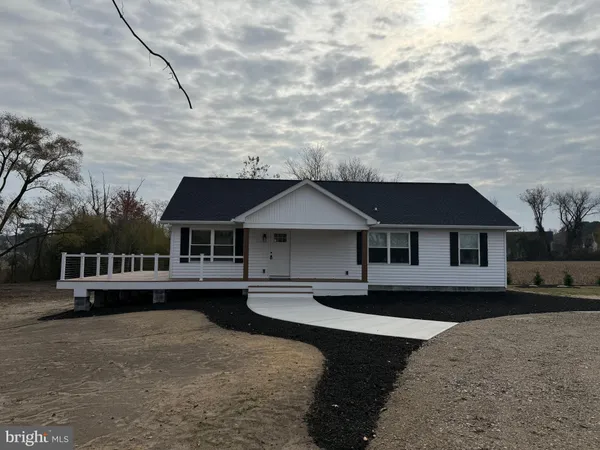 front view of house with a yard