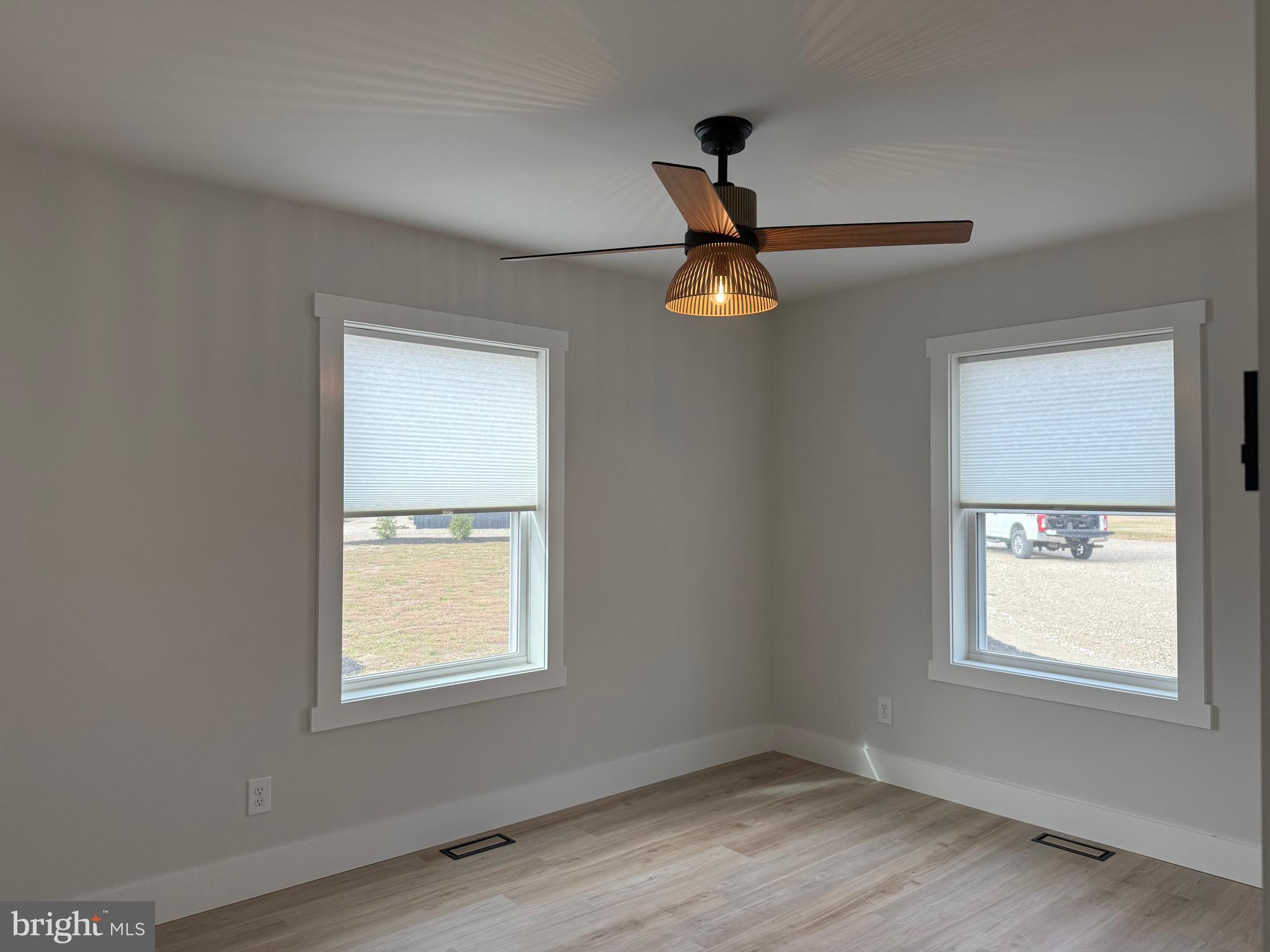 44 A Cedar Beach Road Milford, DE 19963 - Photo 7 of 15 a view of an empty room with a window
