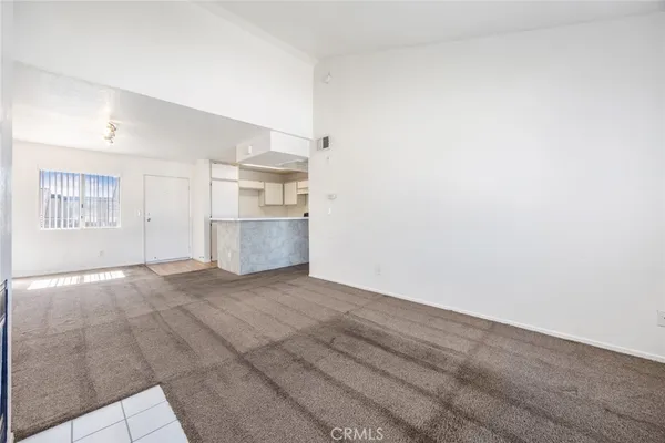 a view of a kitchen with storage and utility