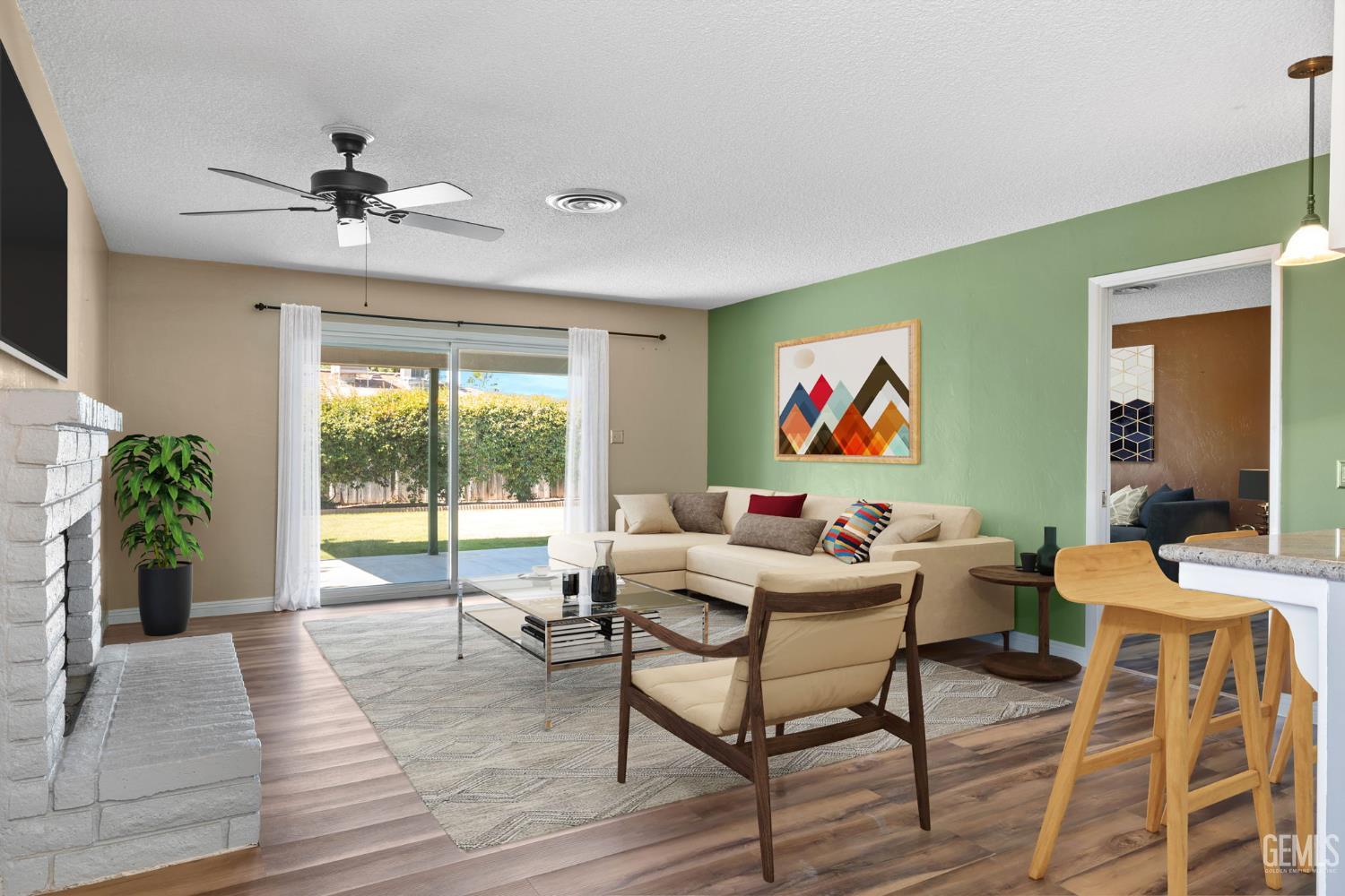 Undisclosed Address Bakersfield, CA 93309 - Photo 14 of 63 a living room with furniture and a large window