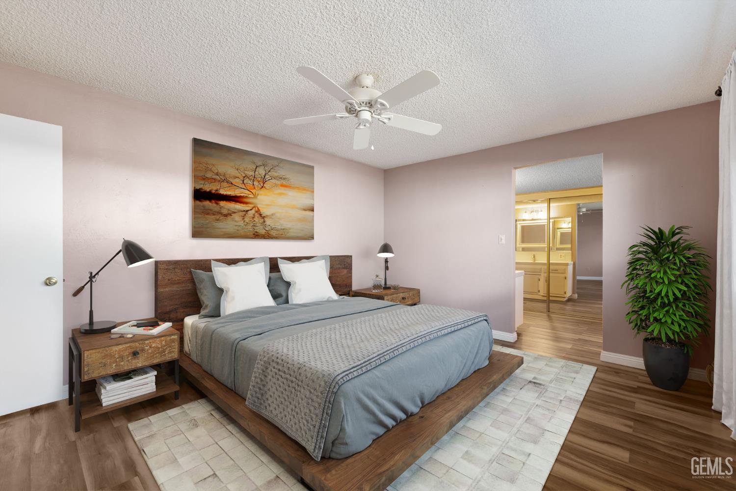 Undisclosed Address Bakersfield, CA 93309 - Photo 24 of 63 a bedroom with a large bed and a chandelier