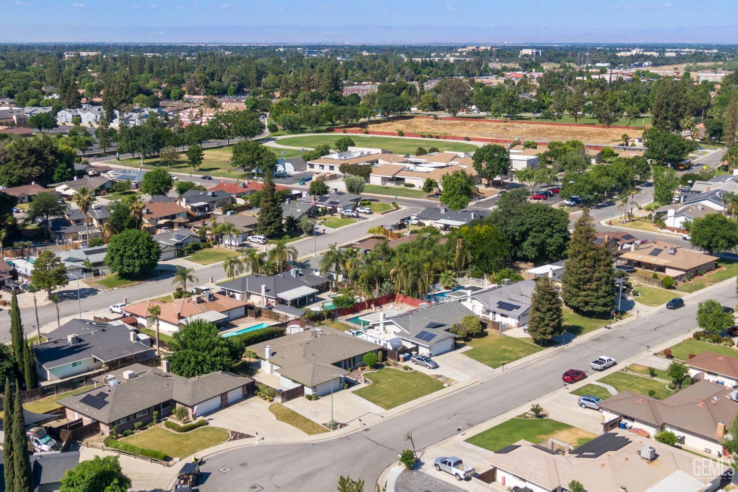 Undisclosed Address Bakersfield, CA 93309 - Photo 40 of 63 an aerial view of a city with lots of residential buildings