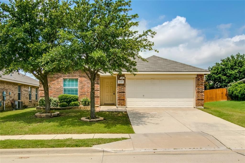 8137 Ruse Springs Lane Fort Worth, TX 76131 - Photo 1 of 1 a front view of a house with a yard and garage