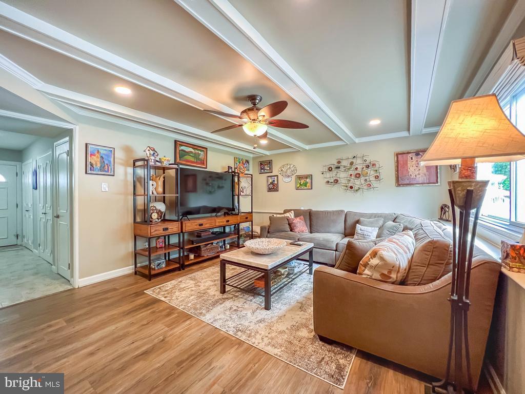 623 Kismet Road Philadelphia, PA 19115 - Photo 10 of 24 a living room with furniture and a flat screen tv